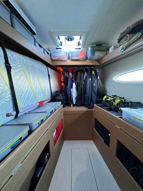 Aboard the Excess 14 you have the option of a storage space that converts into a guest cabin with 2 bunk beds